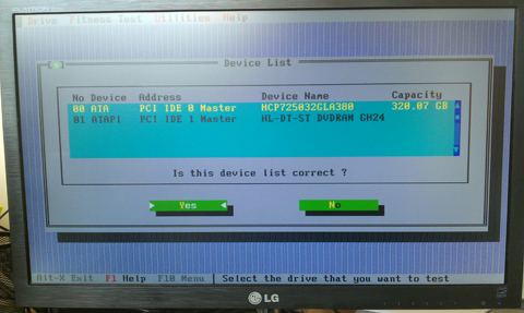 picture of a computer repair technician working at a computer repair company in stevenage hertfordshire using a computer hard disk health test program to check a compuiter hard disk for errors