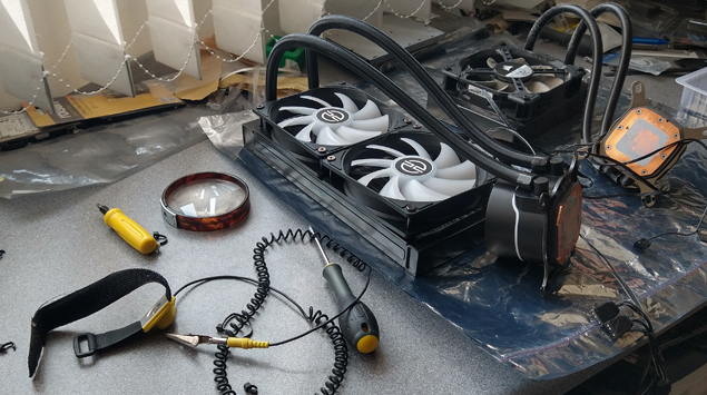 This is a picture of a liquid cooler being installed into a p c computer being upgraded at a p c liquid cooler installation shop in stevenage near hitchin letchworth baldock welwyn garden city hatfield hertford knebworth north herts